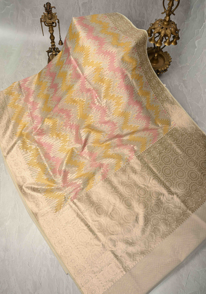 Pastel Hued Rangkaat Style on Banarasi Semi Kora Saree with Chevron Pattern and Zari Border