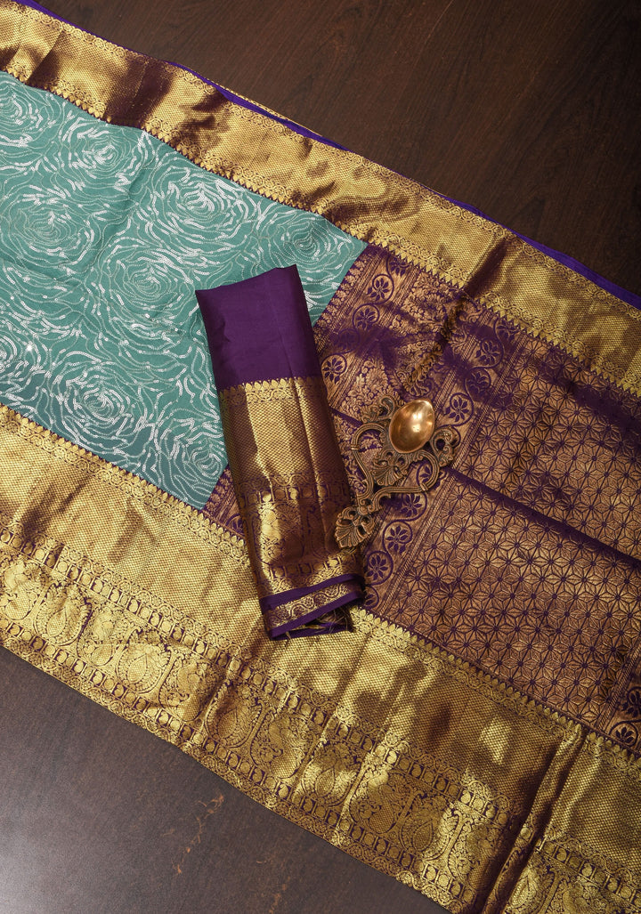 Green Cyan Jaal stunning fusion saree with dainty self sequins and wide Kanjivaram Purple Contrast Border