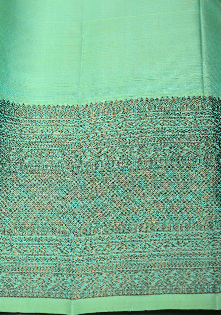 Sea Green kanjivaram Silk Saree with trendy antique black zari buttas and Zari borders | SILK MARK CERTIFIED