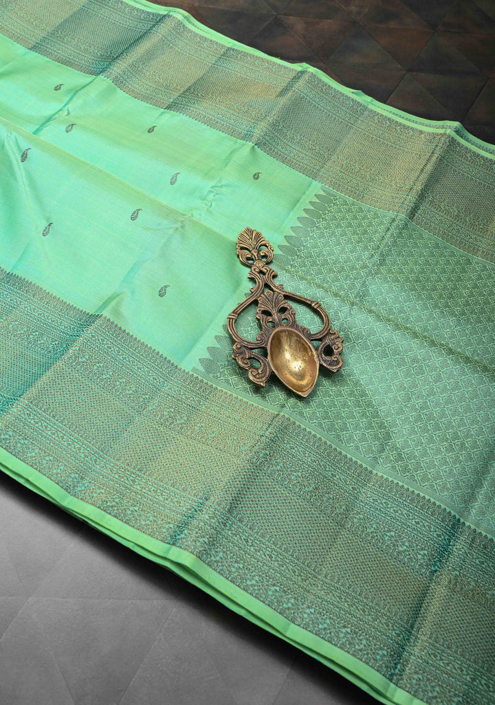 Sea Green kanjivaram Silk Saree with trendy antique black zari buttas and Zari borders | SILK MARK CERTIFIED