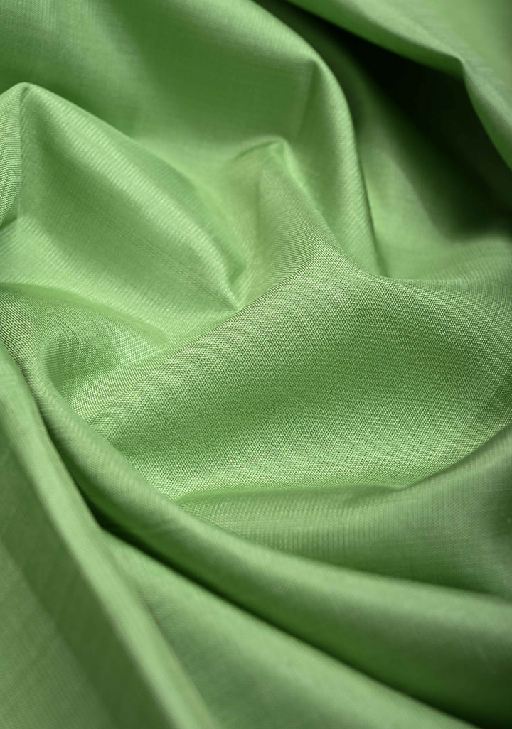 Dusty Pista Green Kanjivaram Silk Saree with Checks Pattern and Distinct Motifs on Contrast Wide 17" Temple Border | SILK MARK CERTIFIED