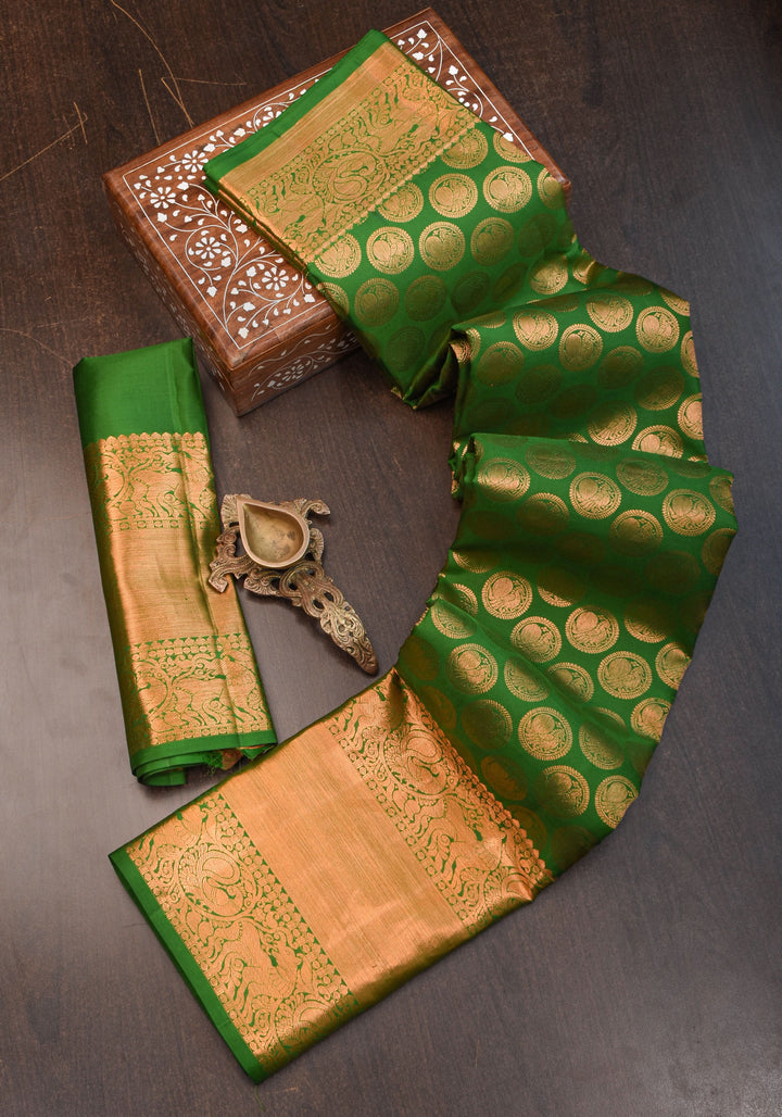 Exquisite Celebrity Grand Brocade Kanjivaram Pure Silk Saree in Leaf Green with Intricate Pallu and Zari  | SILK MARK CERTIFIED