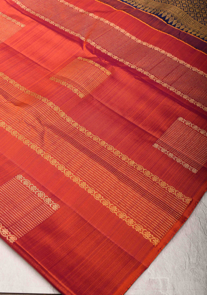 Exquisite Borderless Orange Dual tone Kanjivaram Silk Saree with Vertical Stripes, Geometric Motifs and Contrast Pallu | SILK MARK CERTIFIED
