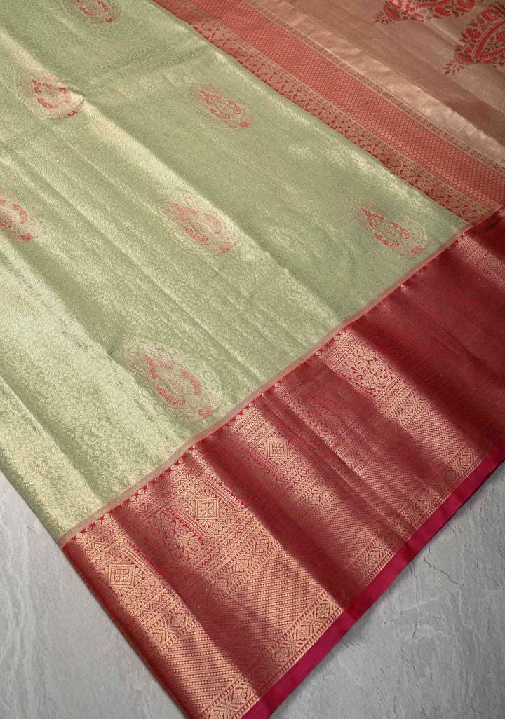 Light Pista Green Brocade Jaal on Kanjivaram Tissue Semi Silk Saree with Meenakari Buttas and Contrast Zari Border