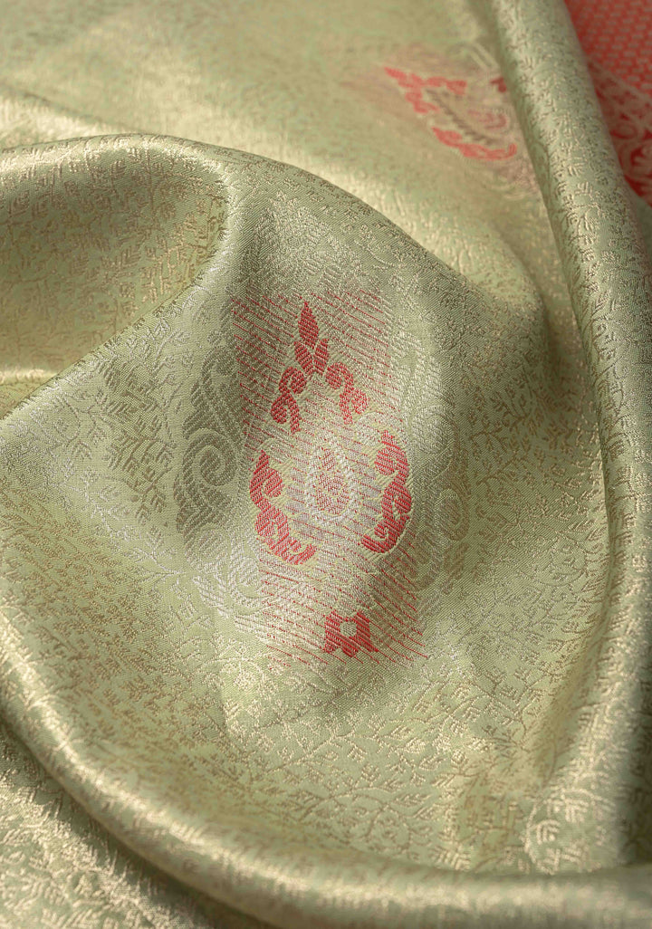 Light Pista Green Brocade Jaal on Kanjivaram Tissue Semi Silk Saree with Meenakari Buttas and Contrast Zari Border