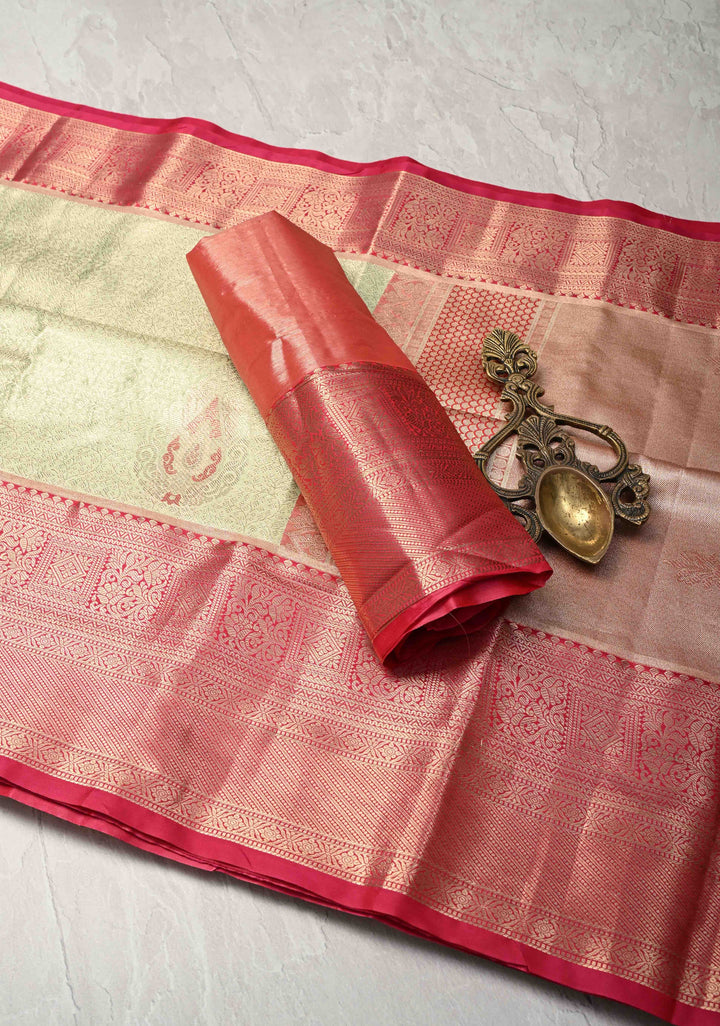 Light Pista Green Brocade Jaal on Kanjivaram Tissue Semi Silk Saree with Meenakari Buttas and Contrast Zari Border