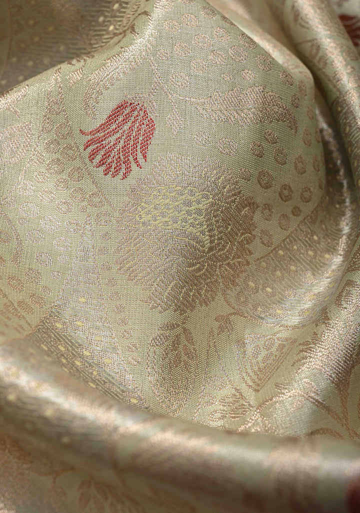 Light Green Brocade on Kanjivaram Tissue Semi Silk Saree with Meenakari Buttas and Contrast Zari Border
