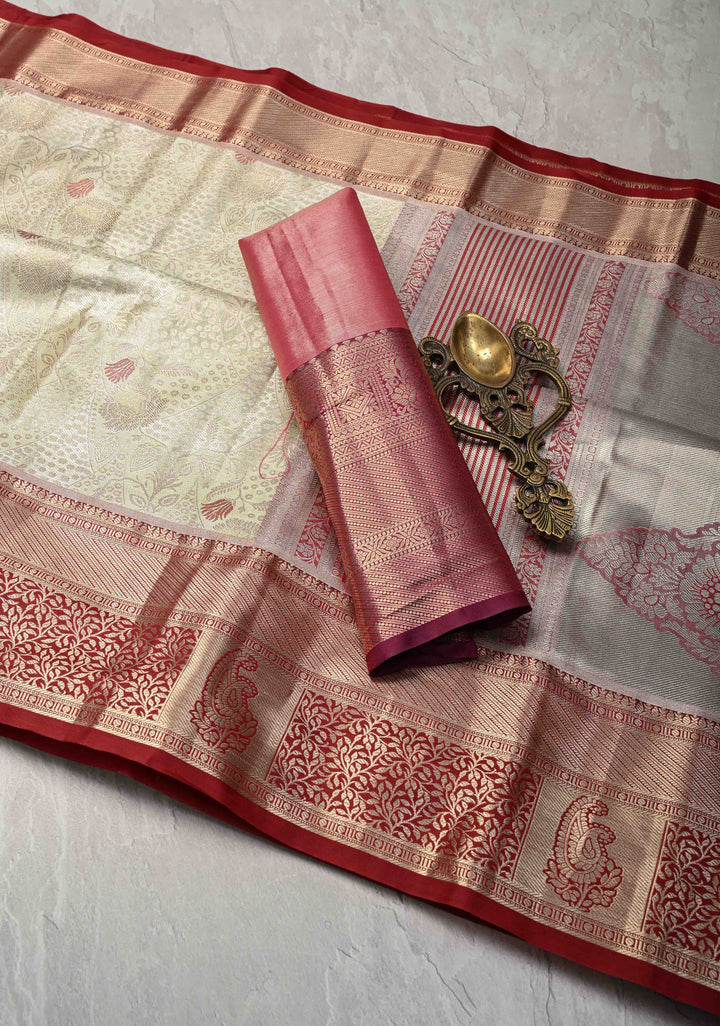 Light Green Brocade on Kanjivaram Tissue Semi Silk Saree with Meenakari Buttas and Contrast Zari Border