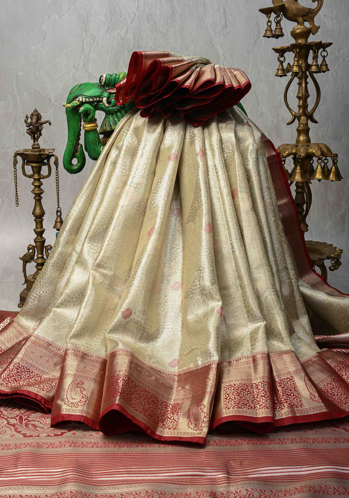 Light Green Brocade on Kanjivaram Tissue Semi Silk Saree with Meenakari Buttas and Contrast Zari Border