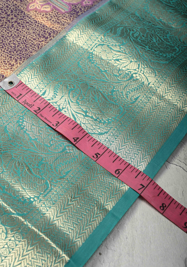 Purple Brocade Jaal on Kanjivaram Tissue Semi Silk Saree with Meenakari Twin Birds Buttas and Contrast Zari Border