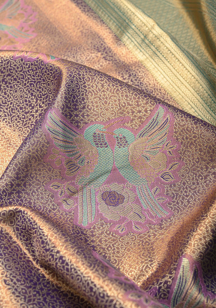 Purple Brocade Jaal on Kanjivaram Tissue Semi Silk Saree with Meenakari Twin Birds Buttas and Contrast Zari Border