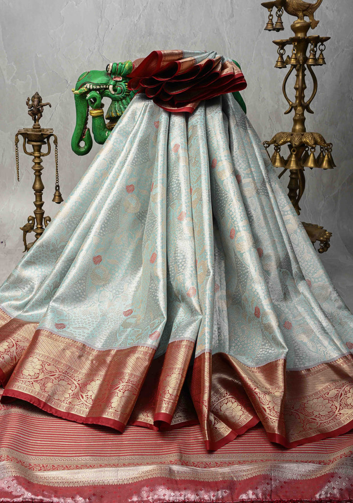Powder Blue Kanjivaram Tissue Semi Silk Saree with Meenakari Floral Brocade and Contrast Zari Border