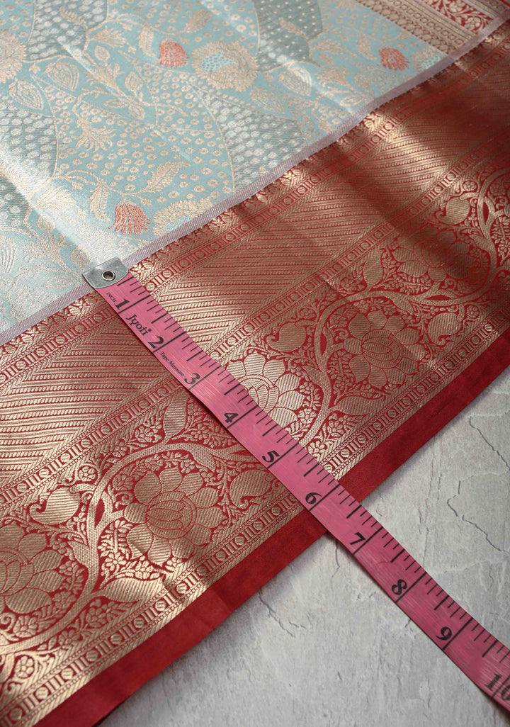 Powder Blue Kanjivaram Tissue Semi Silk Saree with Meenakari Floral Brocade and Contrast Zari Border