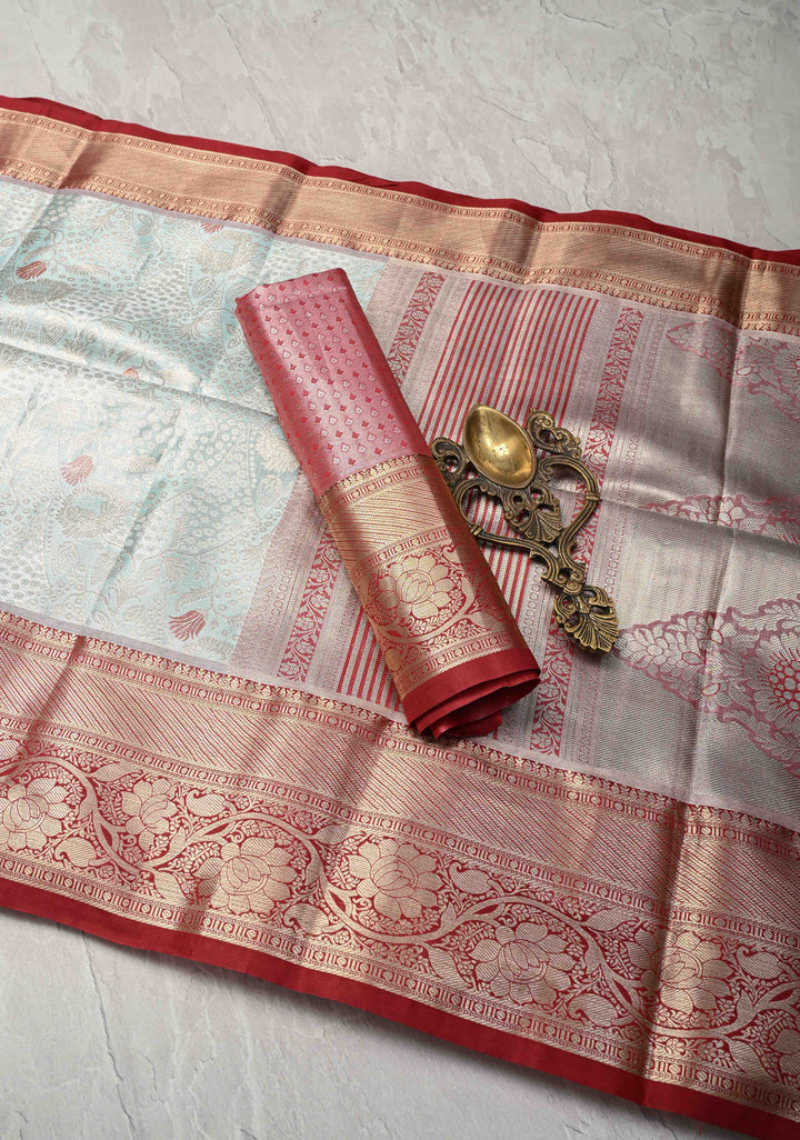 Powder Blue Kanjivaram Tissue Semi Silk Saree with Meenakari Floral Brocade and Contrast Zari Border