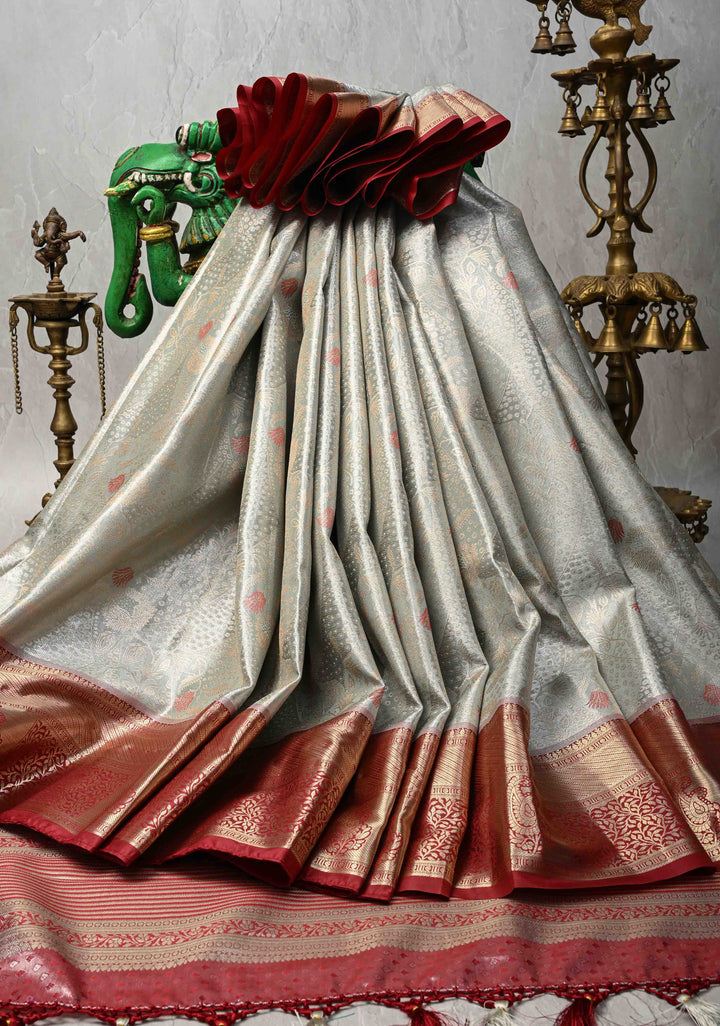 Sage Green Brocade on Kanjivaram Tissue Semi Silk Saree with Meenakari Buttas and Contrast Zari Border