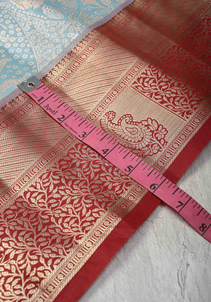 Powder Blue Kanjivaram Tissue Semi Silk Saree with Meenakari Floral Brocade and Contrast Zari Border