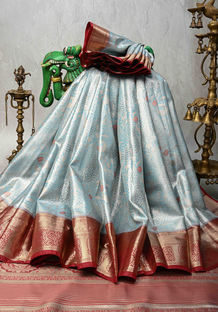 Powder Blue Kanjivaram Tissue Semi Silk Saree with Meenakari Floral Brocade and Contrast Zari Border