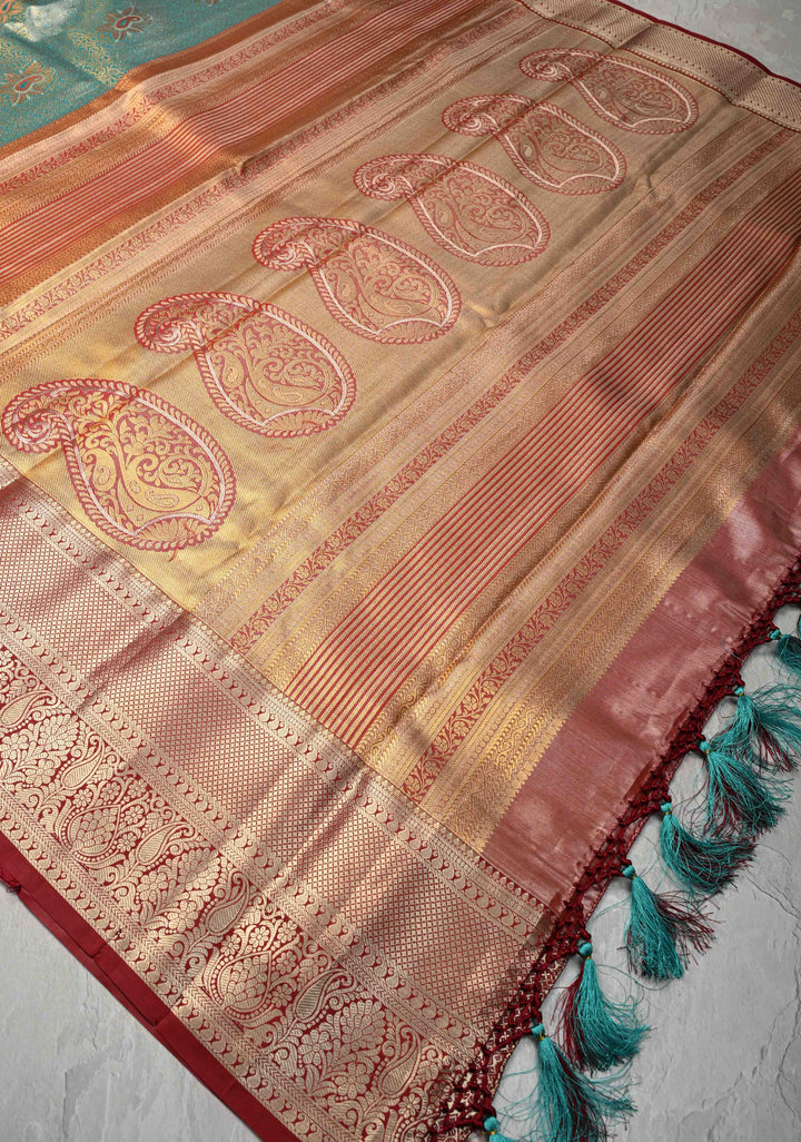 Teal Brocade Jaal on Kanjivaram Tissue Semi Silk Saree with Meenakari Buttas and Contrast Zari Border