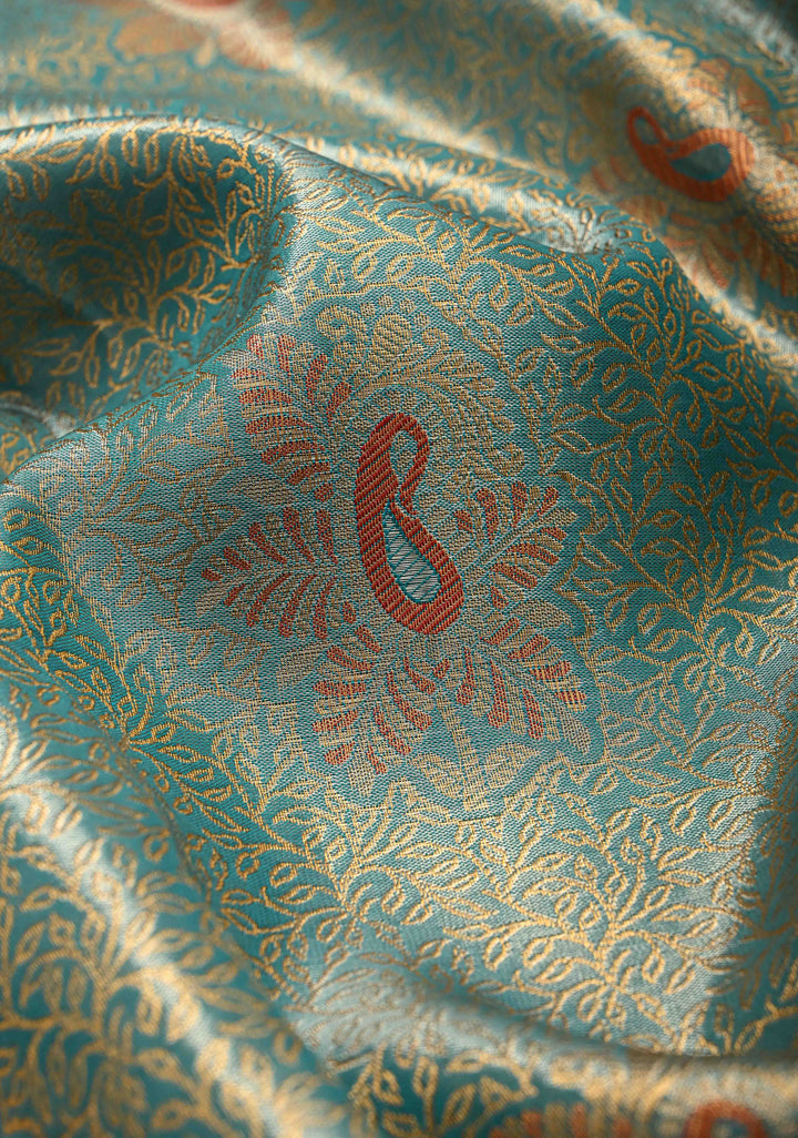Teal Brocade Jaal on Kanjivaram Tissue Semi Silk Saree with Meenakari Buttas and Contrast Zari Border