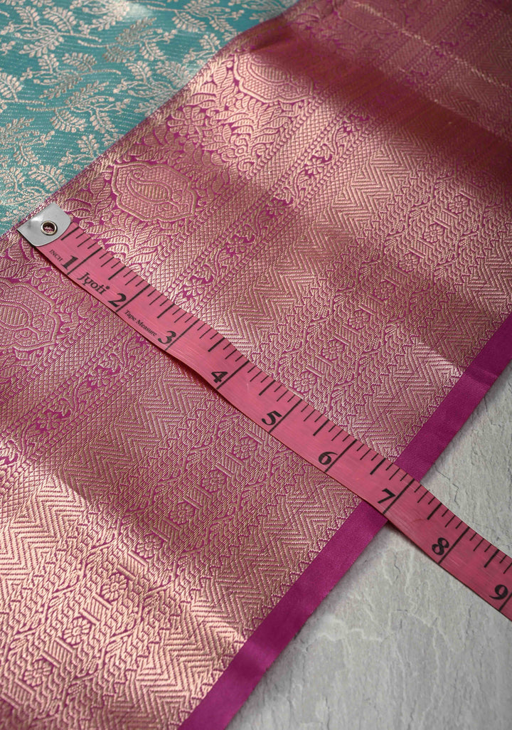 Dusty Teal Floral Jaal on Kanjivaram Tissue Semi Silk Saree with Meenakari Buttas and Contrast Zari Border