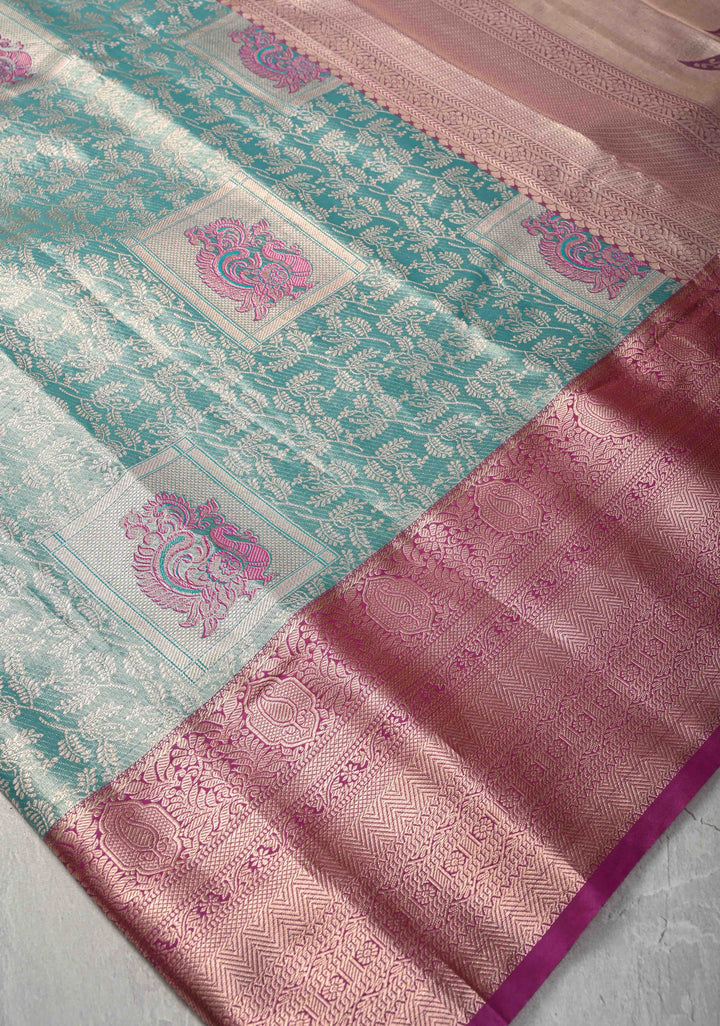 Dusty Teal Floral Jaal on Kanjivaram Tissue Semi Silk Saree with Meenakari Buttas and Contrast Zari Border
