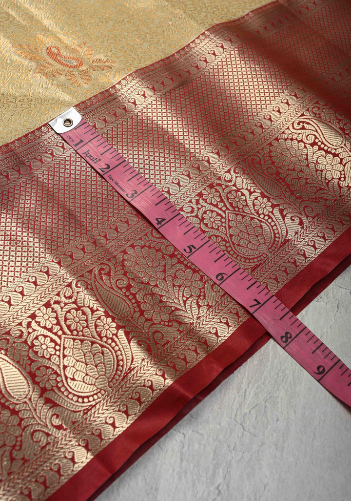 Pastel Green Brocade on Kanjivaram Tissue Semi Silk Saree with Meenakari Buttas and Contrast Zari Border