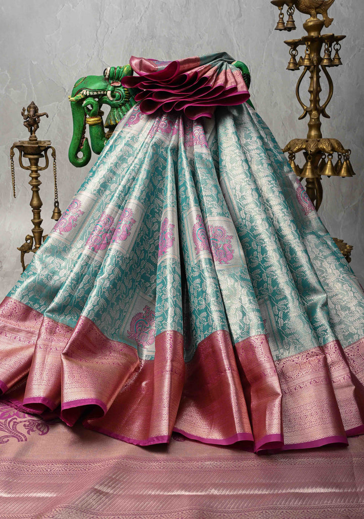 Dusty Teal Floral Jaal on Kanjivaram Tissue Semi Silk Saree with Meenakari Buttas and Contrast Zari Border