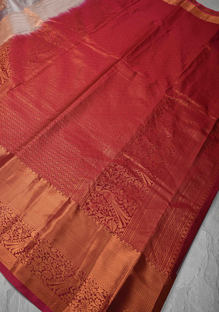 Light Dusty Mauve Kanjivaram Semi Silk Saree with Meenakari Buttas and Contrast Zari Border