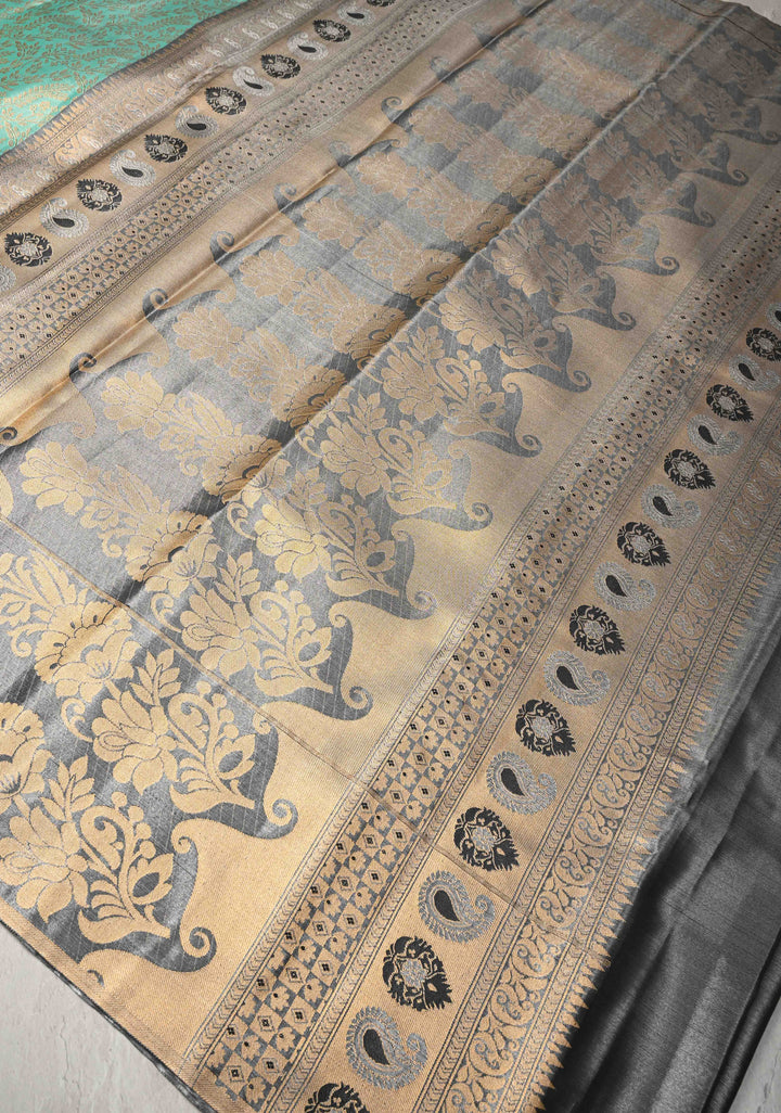 Rama Green Kanjivaram Tissue Semi Silk Saree with Floral Brocade Jaal and Contrast Meenakari Peacock Border