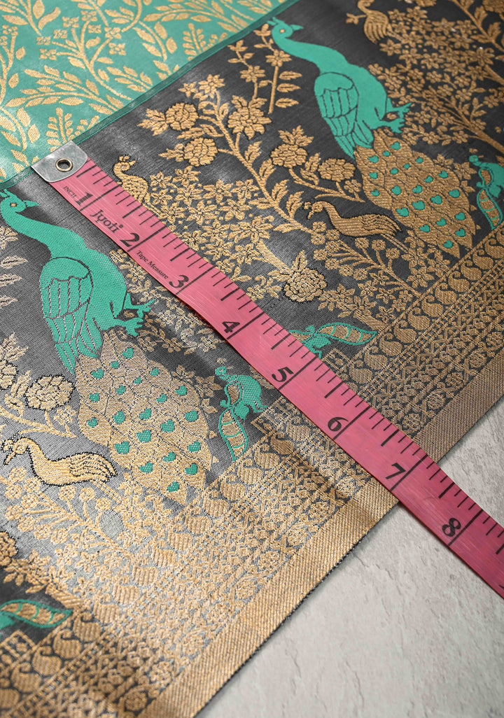 Rama Green Kanjivaram Tissue Semi Silk Saree with Floral Brocade Jaal and Contrast Meenakari Peacock Border