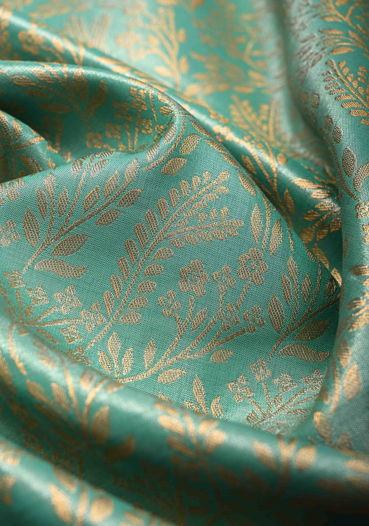 Rama Green Kanjivaram Tissue Semi Silk Saree with Floral Brocade Jaal and Contrast Meenakari Peacock Border