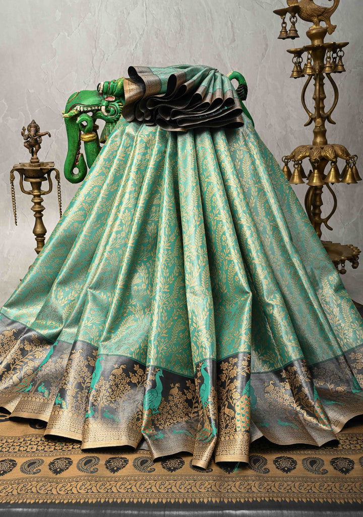 Rama Green Kanjivaram Tissue Semi Silk Saree with Floral Brocade Jaal and Contrast Meenakari Peacock Border