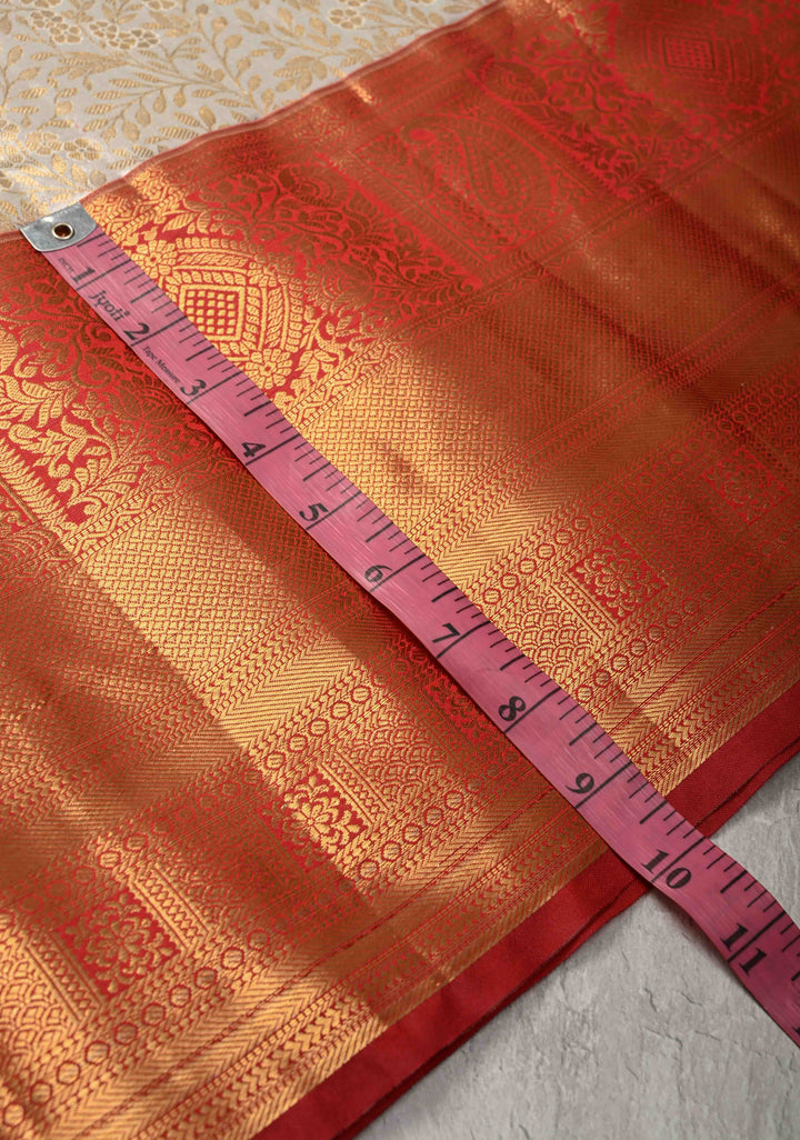 White Kanjivaram Tissue Semi Silk Saree with Meenakari Floral Brocade Jaal and Contrast Zari Border