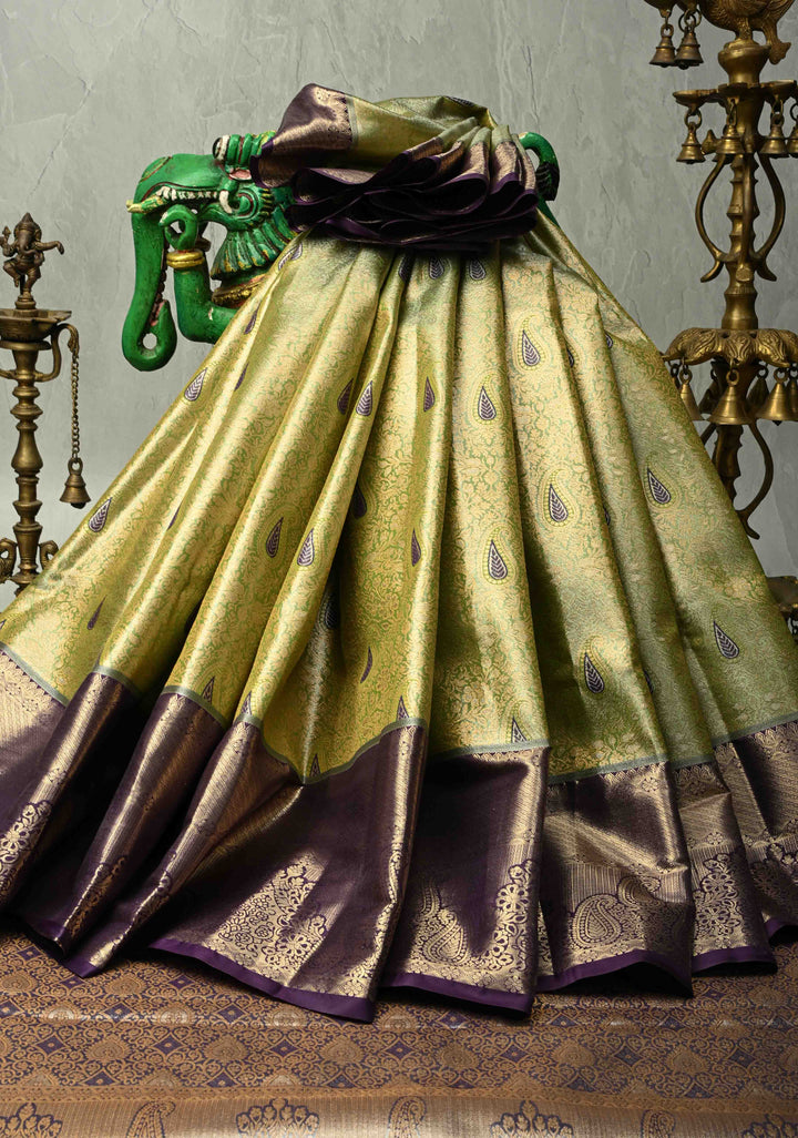 Apple Green Kanjivaram Tissue Semi Silk Saree with Meenakari Floral Brocade Jaal and Contrast Wide Zari Border
