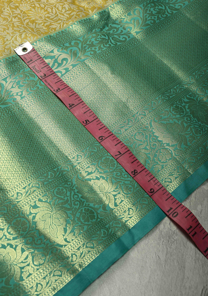 Exquisite Yellow Kanjivaram Tissue Semi Silk Saree with Floral Brocade Jaal and Contrast Wide Zari Border