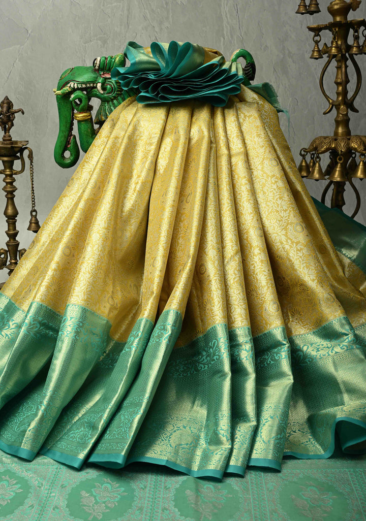Exquisite Yellow Kanjivaram Tissue Semi Silk Saree with Floral Brocade Jaal and Contrast Wide Zari Border