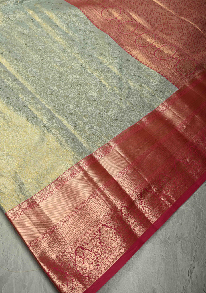 Light Sage Green Kanjivaram Tissue Semi Silk Saree with Meenakari Floral Brocade Jaal and Contrast Wide Zari Border