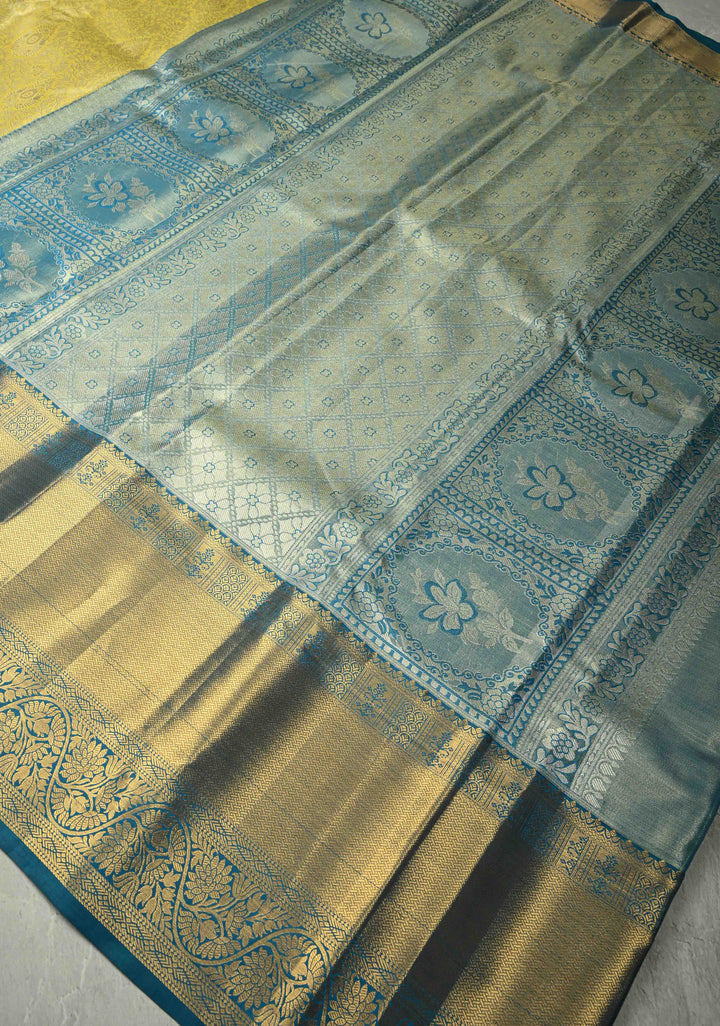 Butter Yellow Kanjivaram Tissue Semi Silk Saree with Meenakari Floral Brocade Jaal and Blue Zari Border