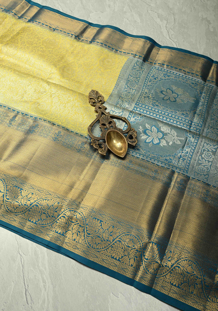 Butter Yellow Kanjivaram Tissue Semi Silk Saree with Meenakari Floral Brocade Jaal and Blue Zari Border