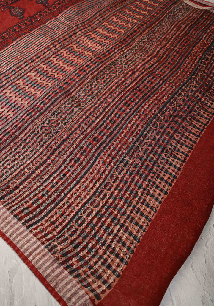 Deep Red Linen by Cotton Saree with Ajrakh Handblock Print and Minimal Silver Zari Border