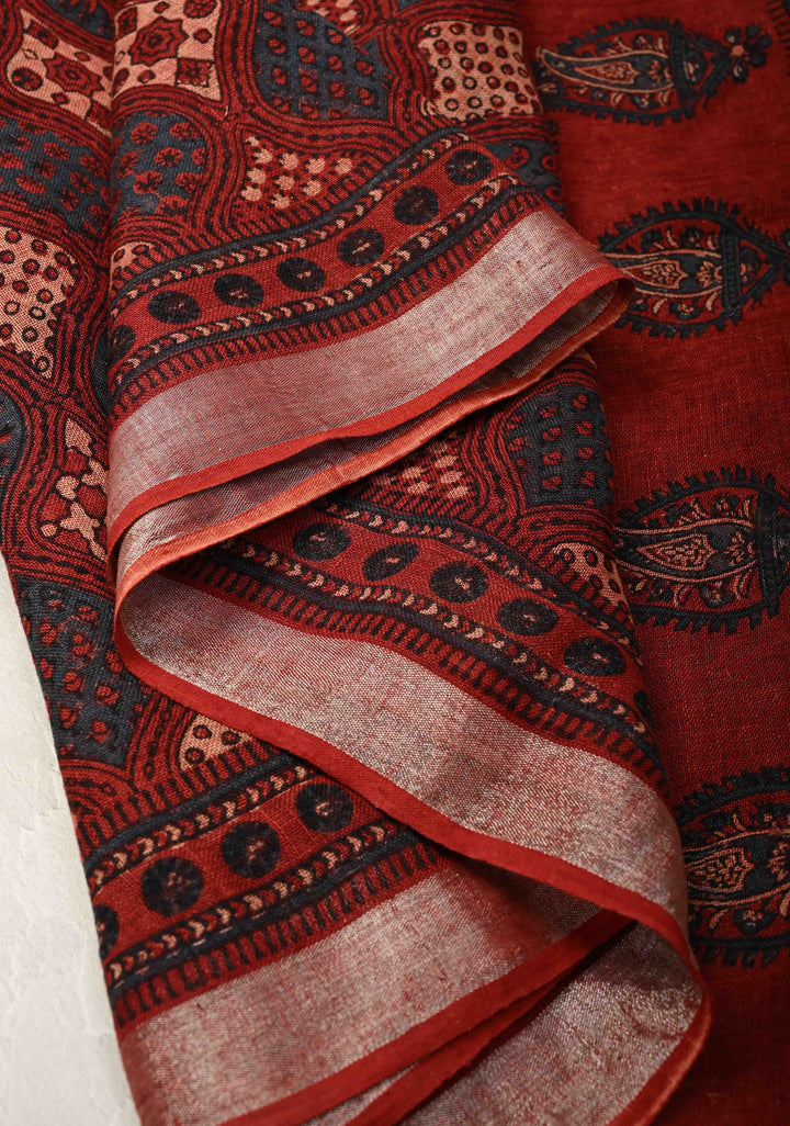 Deep Red Linen by Cotton Saree with Ajrakh Handblock Print and Minimal Silver Zari Border