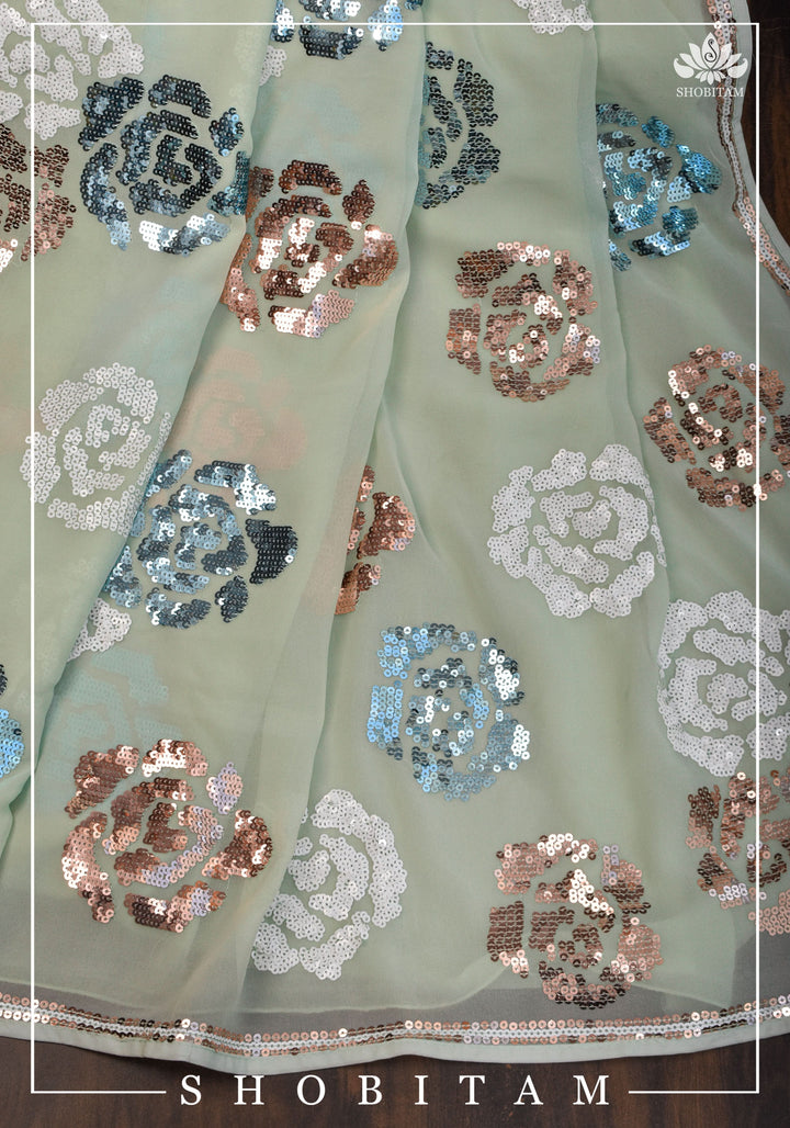 Georgette Saree in pale pista green with rose design sequin work