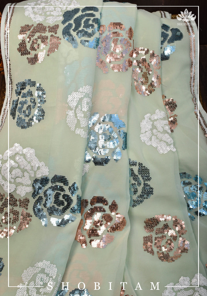 Georgette Saree in pale pista green with rose design sequin work