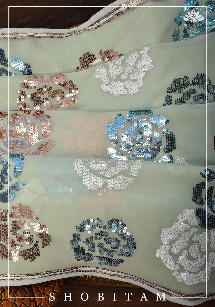 Georgette Saree in pale pista green with rose design sequin work