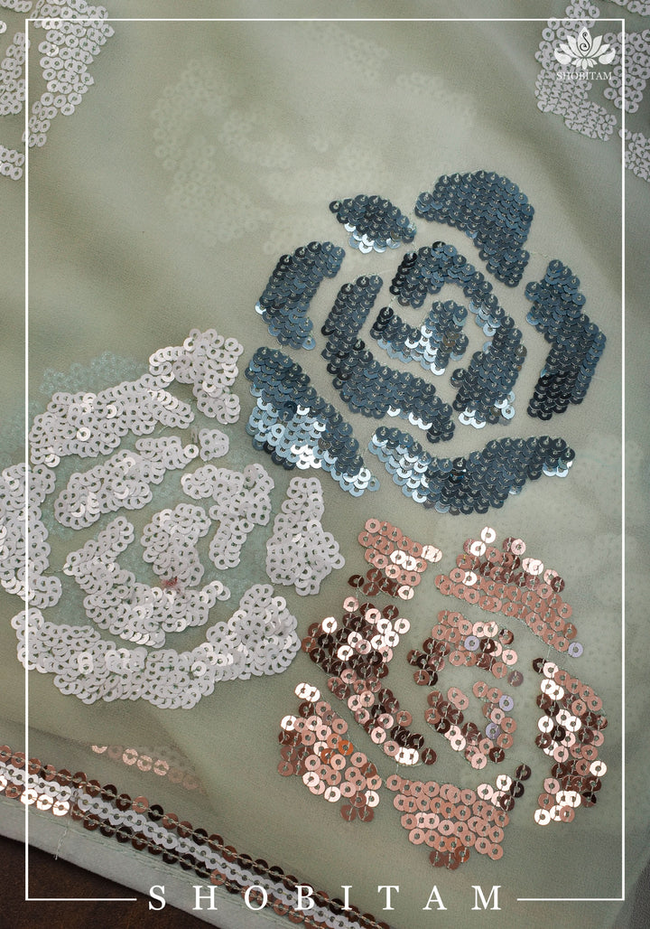 Georgette Saree in pale pista green with rose design sequin work