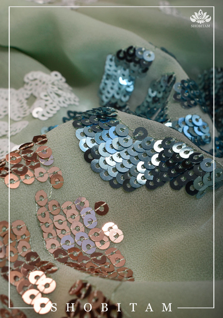 Georgette Saree in pale pista green with rose design sequin work