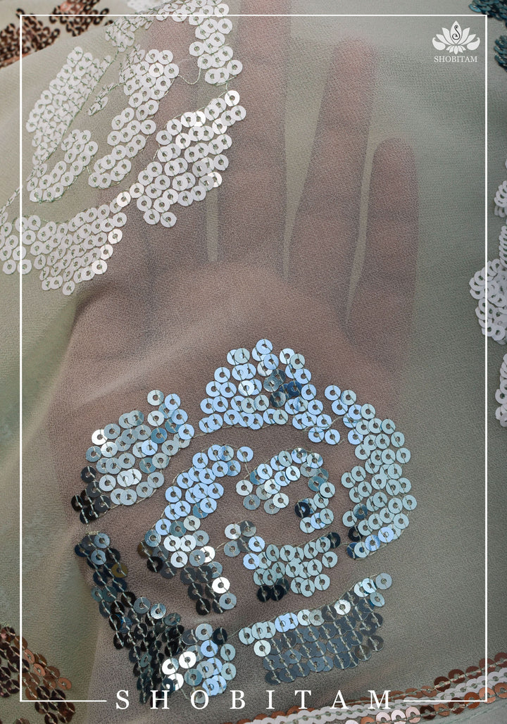 Georgette Saree in pale pista green with rose design sequin work