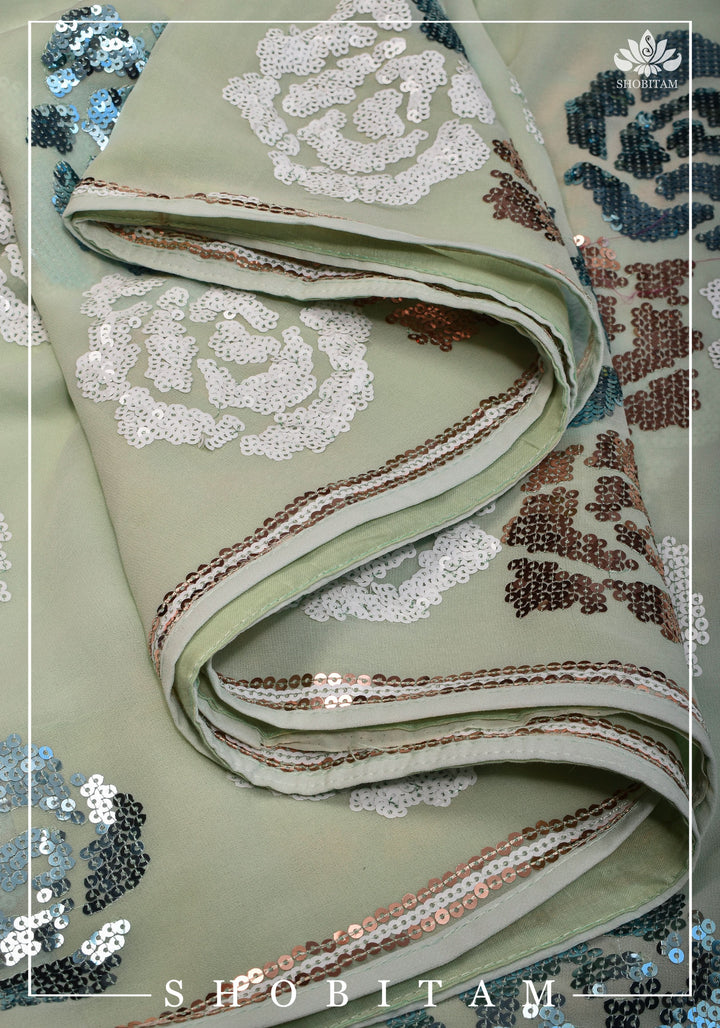 Georgette Saree in pale pista green with rose design sequin work