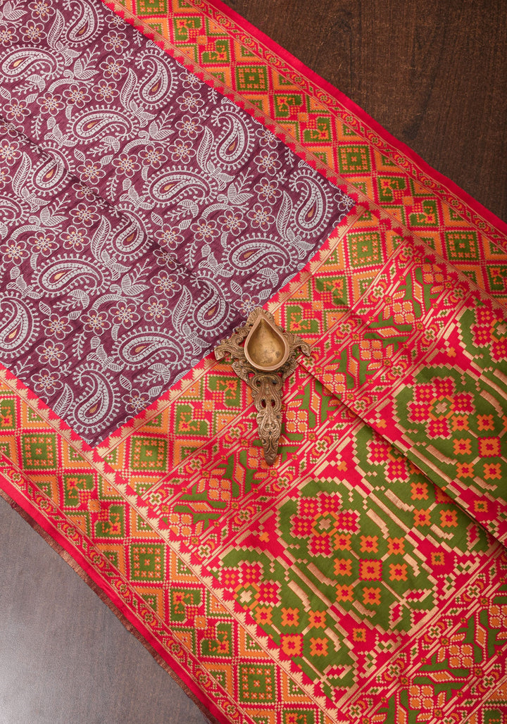Rayon Saree Paisley woven Motifs in Maroon with Geometric Weave Border and Pallu