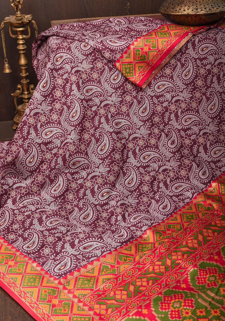 Rayon Saree Paisley woven Motifs in Maroon with Geometric Weave Border and Pallu
